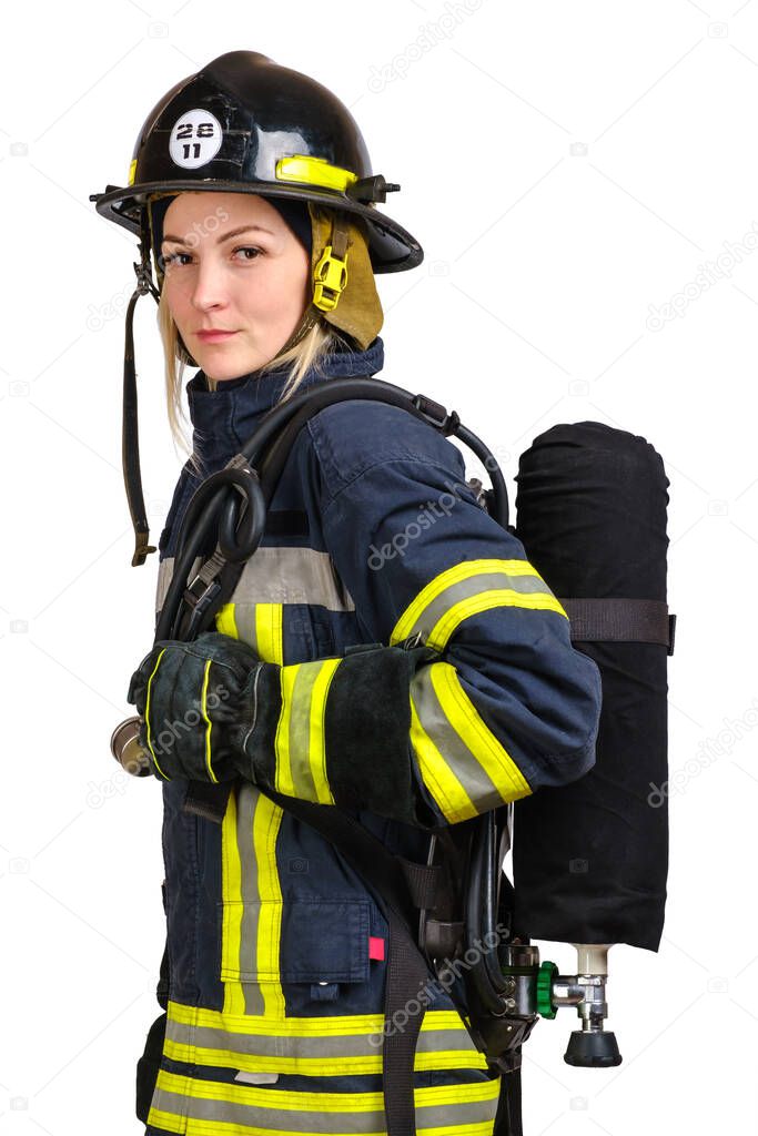 Woman in uniform of firefighter posing in profile with air tank