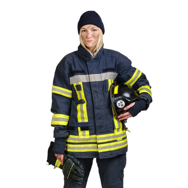 Mujer con la cara sucia en uniforme de bombero sostiene hardhat y guantes —  Fotos de Stock