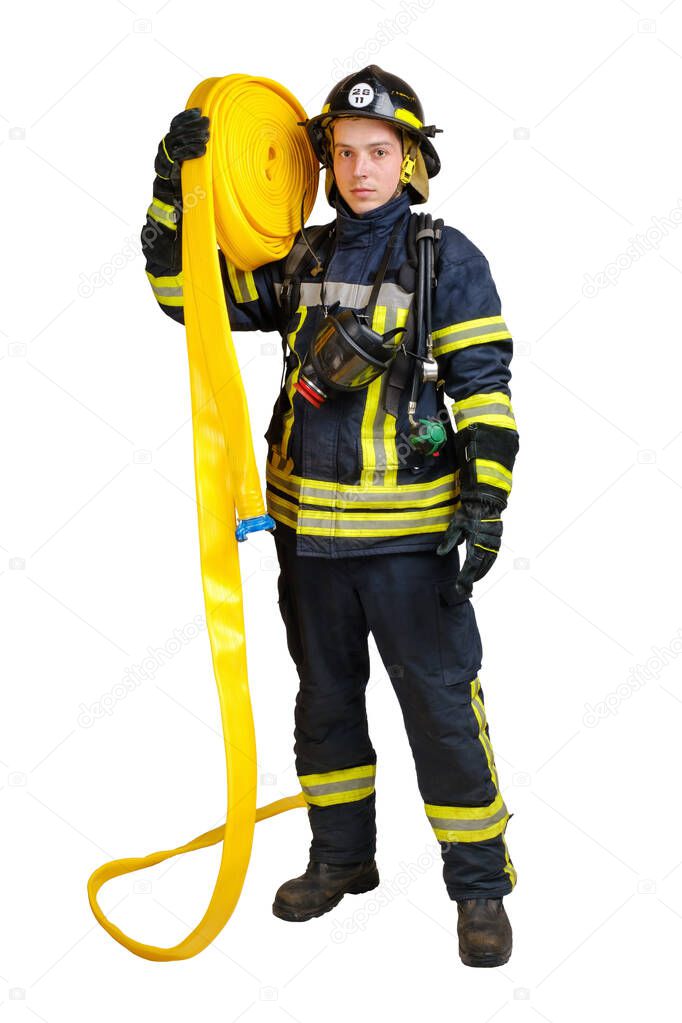 Man in uniform of firefighter holds hardhat and fire hose