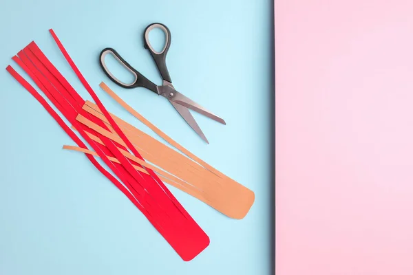 Kinesiology tape and scissors on pink blue background — Foto de Stock