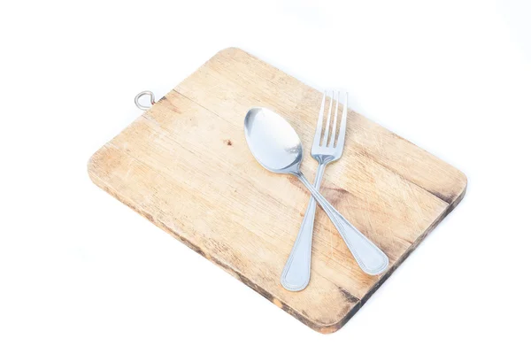 kaşık ve çatal kesme tahtası üzerinde