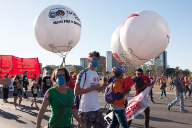Brasilia, Brezilya, DF 25 Temmuz 2021: Başkentte ve Brezilya genelinde, Covid-19 aşı yönetimine karşı büyük bir protesto.