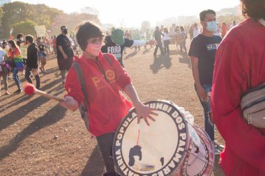 Brasilia, Brezilya, DF 25 Temmuz 2021: Başkentte ve Brezilya genelinde, Covid-19 aşı yönetimine karşı büyük bir protesto.