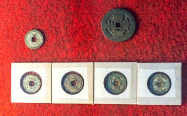 Collectibles ancient coin in reign of Mac dynasty, posterior Le 1428 - 1677 feudal period in Vietnam. This made of bronze coins used as prize money for the official to have great success with court clipart