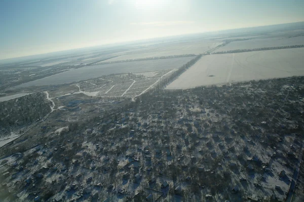 Vista aérea de casas y calles en invierno — Foto de Stock