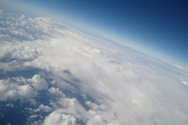 Nuvole e cielo blu visti da aereo Fotografia Stock