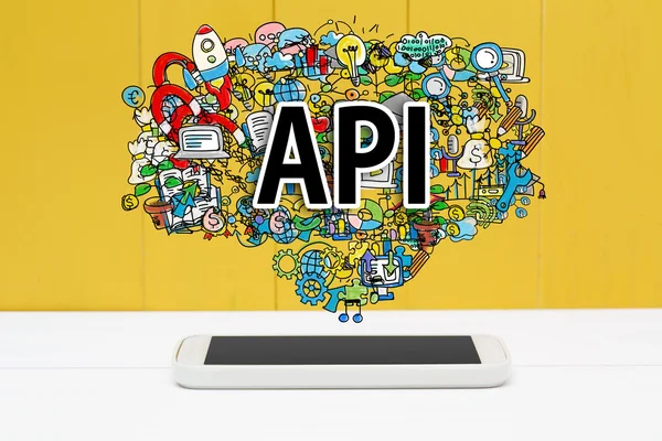 API koncept s smartphone — Stock fotografie