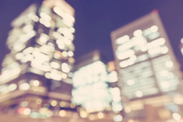 Escena de fondo de la ciudad desenfocada por la noche — Foto de Stock