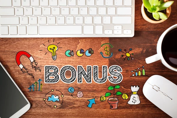 Concetto bonus con workstation — Foto Stock