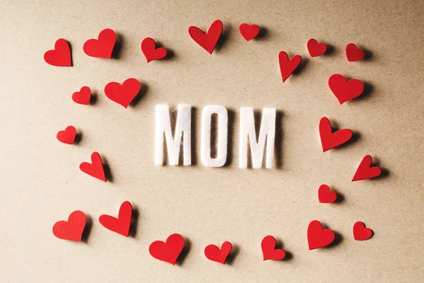 MOM text with small red hearts — Stock Photo, Image