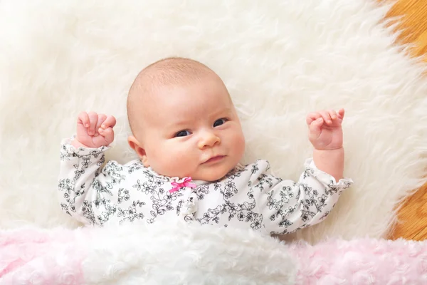 Newborn baby girl on her blanket Royalty Free Stock Photos