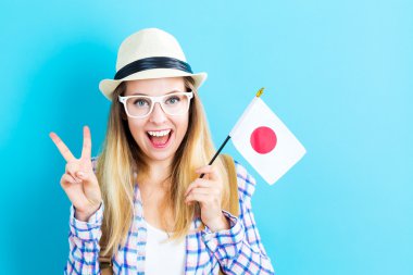 Japon bayrağı tutan kadın seyahat