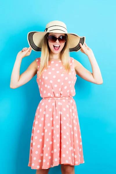Happy woman wearing hat and sunglasses — Stock Photo, Image