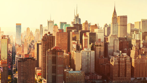 Aerial view of the New York City skyline near Midtown at sunset