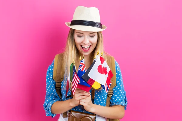 Young woman deciding where to travel — Stock Photo, Image