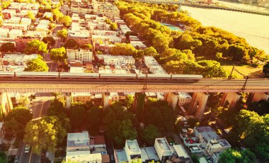 train crossing the Hell Gate Bridge in NY clipart