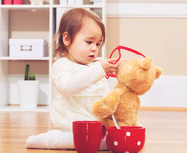 Girl with teddy bear — Stock Photo, Image