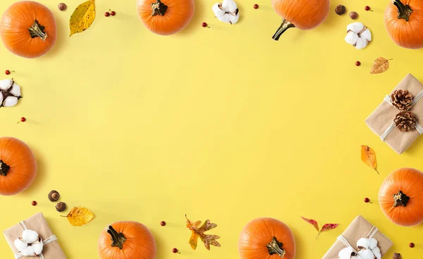 Autumn theme with orange pumpkins