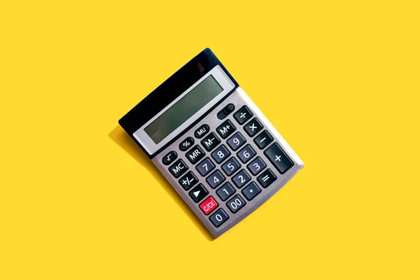 Calculator with shadow overhead view — Stock Photo, Image