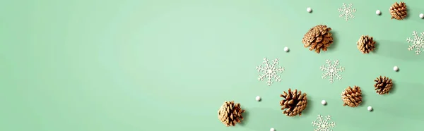 Christmas pine cones with snow flakes — Stock Photo, Image