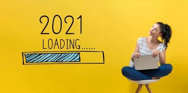 Loading new year 2021 with woman using a laptop — Stock Photo, Image