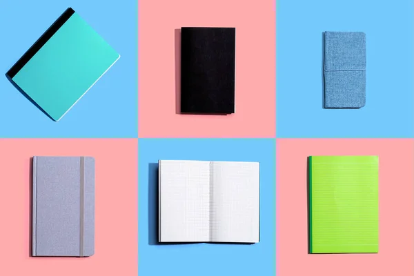 Cuadernos en un escritorio de azulejos desde arriba —  Fotos de Stock