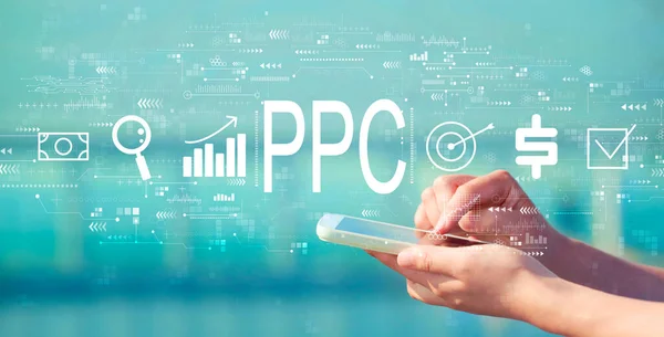 PPC - Pay per click concept met smartphone — Stockfoto
