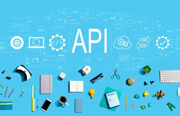 API - concepto de interfaz de programación de aplicaciones con aparatos electrónicos y suministros de oficina —  Fotos de Stock