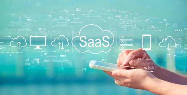 SaaS - oprogramowanie jako koncepcja serwisu ze smartfonem — Zdjęcie stockowe