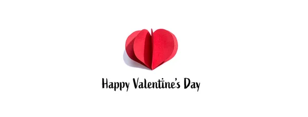 Valentijnsdag massage met een papieren ambachtelijke hart — Stockfoto