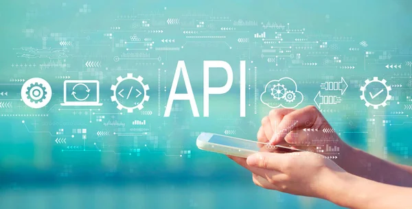 API - conceito de interface de programação de aplicativos com smartphone — Fotografia de Stock