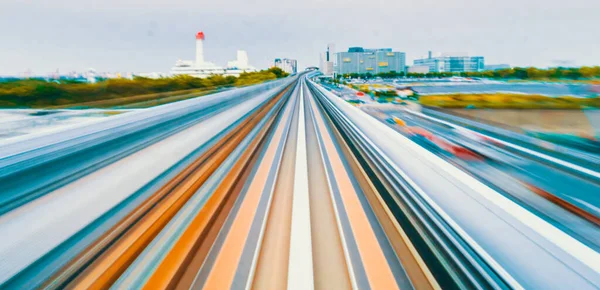 Ruch POV pociągu zamazana koncepcja z Yuikamome monorail w Tokio, Japonia — Zdjęcie stockowe