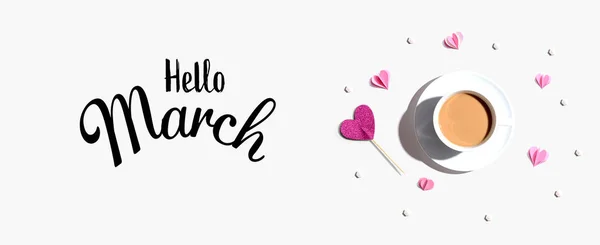 Hello March message with a cup of coffee and paper hearts — Stock Photo, Image