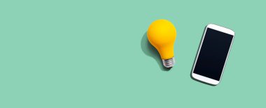 Sarı ampullü akıllı telefon.