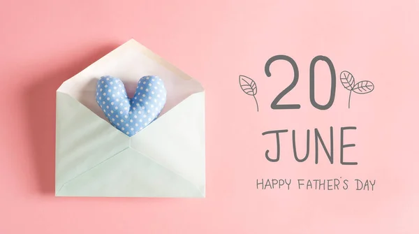 Fathers Day message with a blue heart cushion — Stock Photo, Image