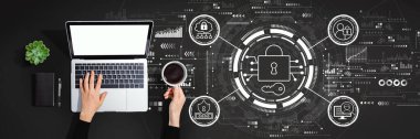 Dizüstü bilgisayar kullanan kişi ile veri güvenliği kavramı