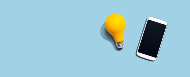 Sarı ampullü akıllı telefon.