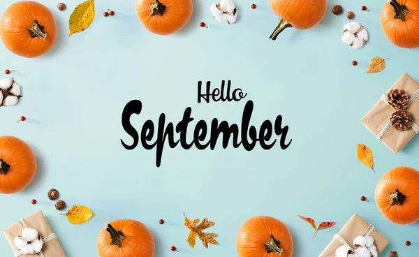 Hello September message with autumn pumpkins with present boxes — Stock Photo, Image