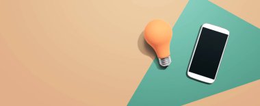 Sarı ampullü akıllı telefon.