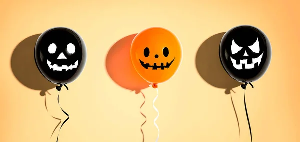 Halloween balloon ghosts with happy faces — Stock Photo, Image