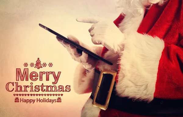 Santa Claus with tablet — Stock Photo, Image