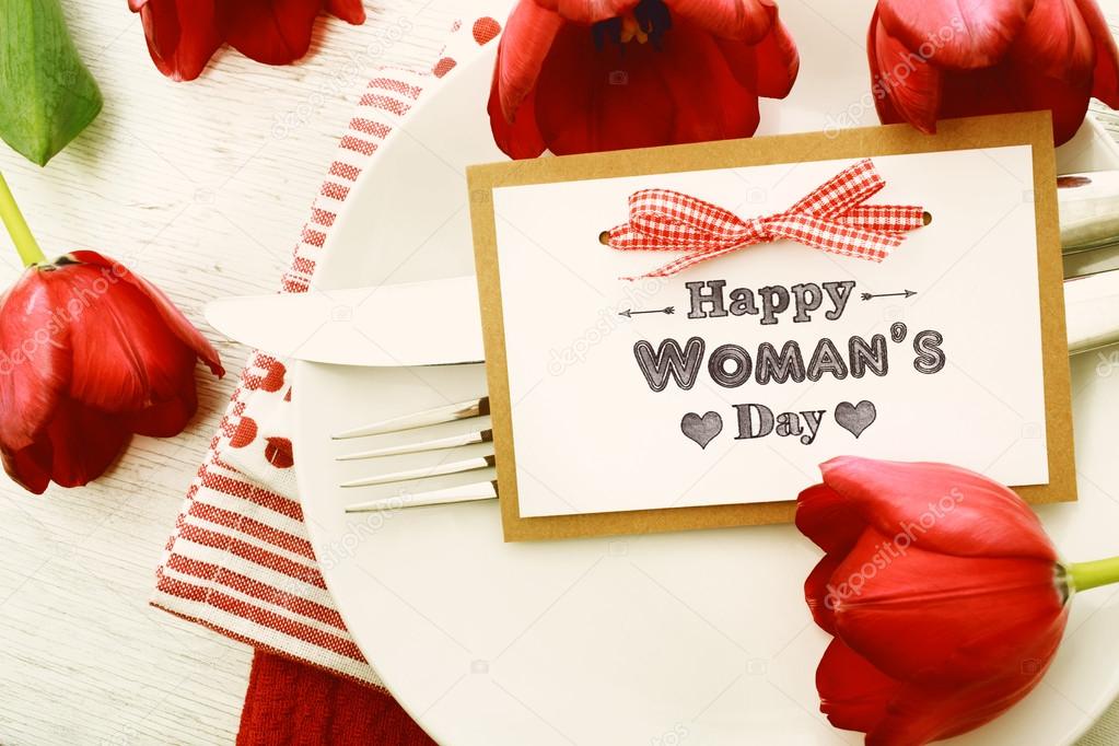 Womans day message card and tulips