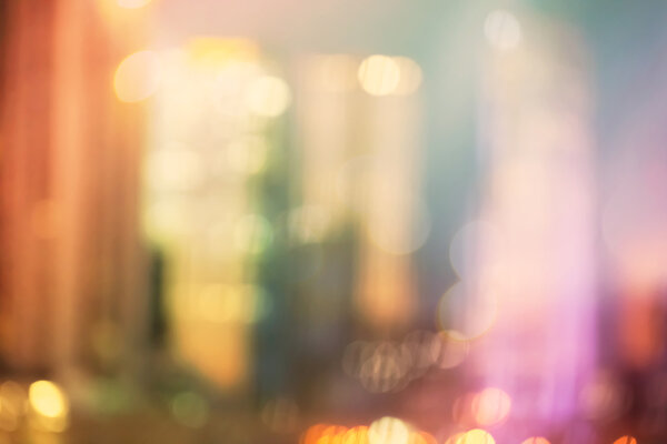 Blurred colorful urban building background scene with bokeh lights