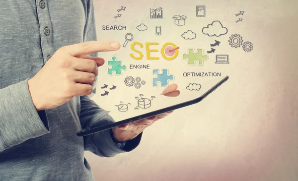 Man wijzend op Seo concept — Stockfoto