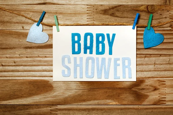 Baby shower card hanging with clothespins — Stock Photo, Image