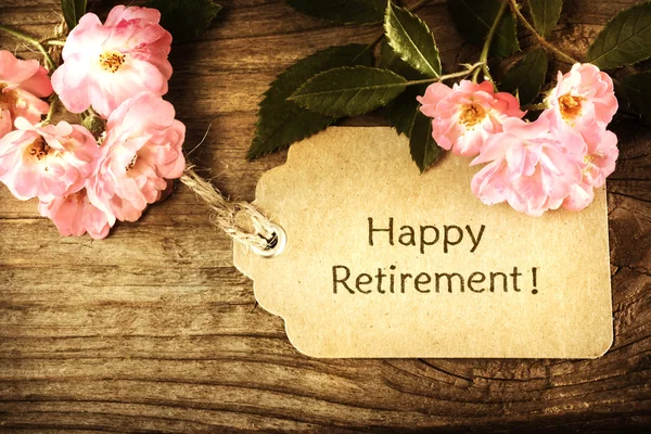 Mensagem feliz aposentadoria com rosas — Fotografia de Stock