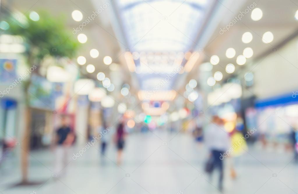 Blurred shopping mall with people walking