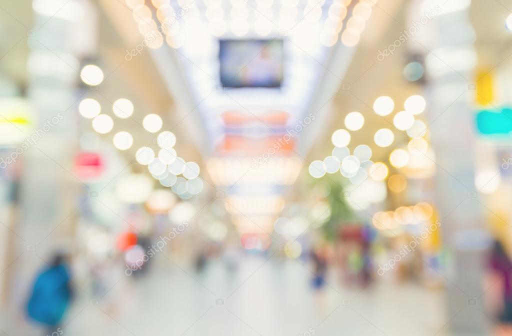 Blurred shopping mall with people walking