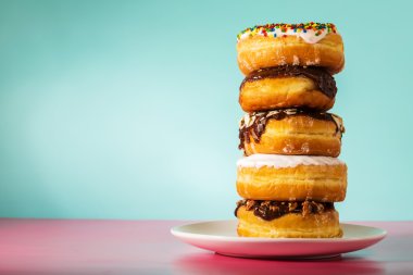Stack of assorted donuts clipart