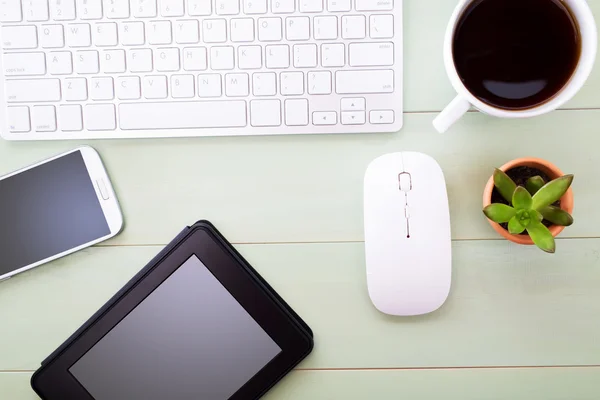 Neat workstation on a wooden desk